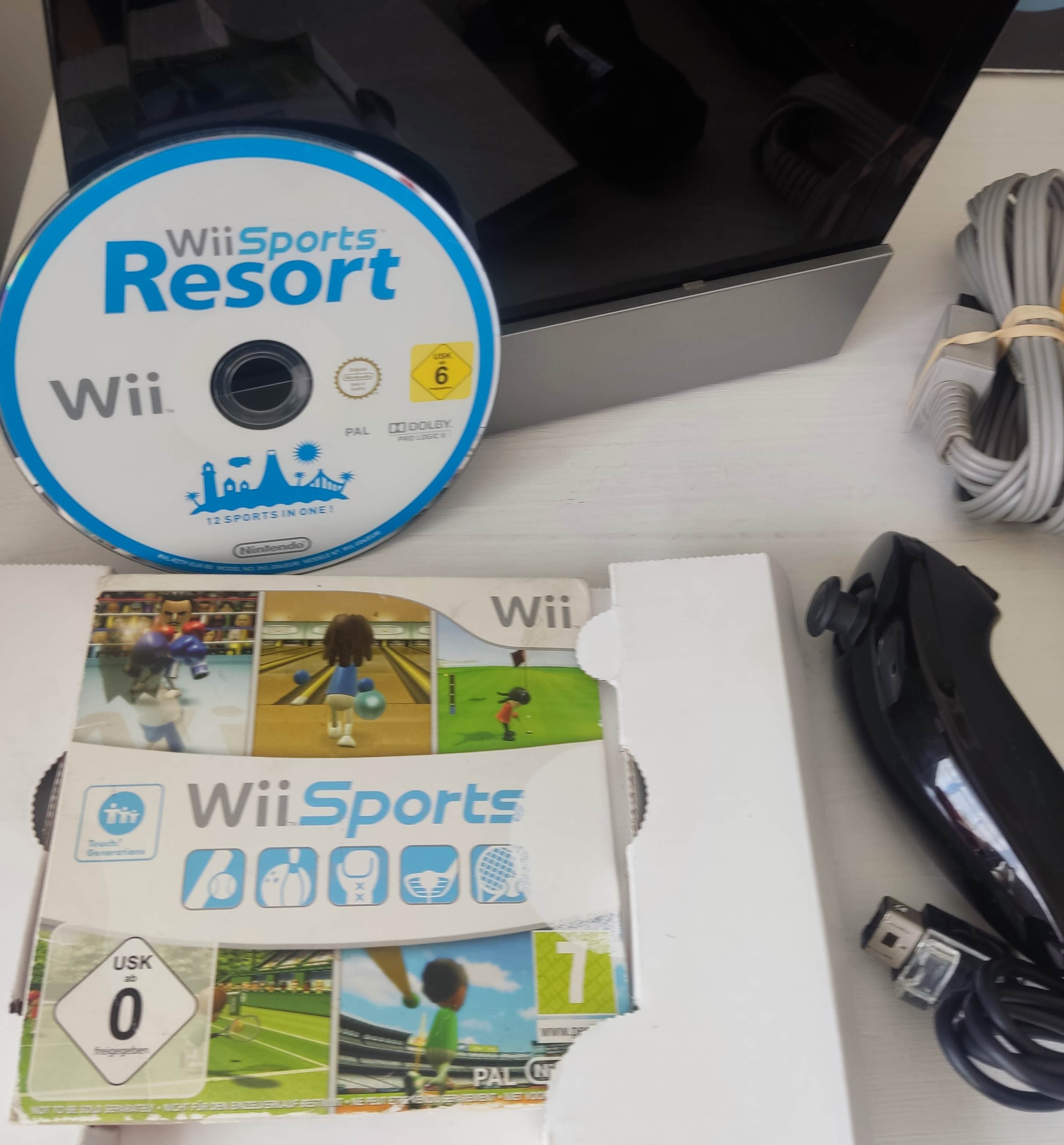 Nintendo Wii with Wii Sports Resort and Wii Sports games for sale in